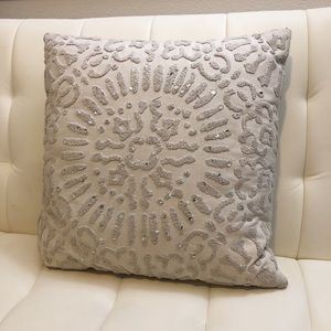 Accent pillow with sequin embroidered accents